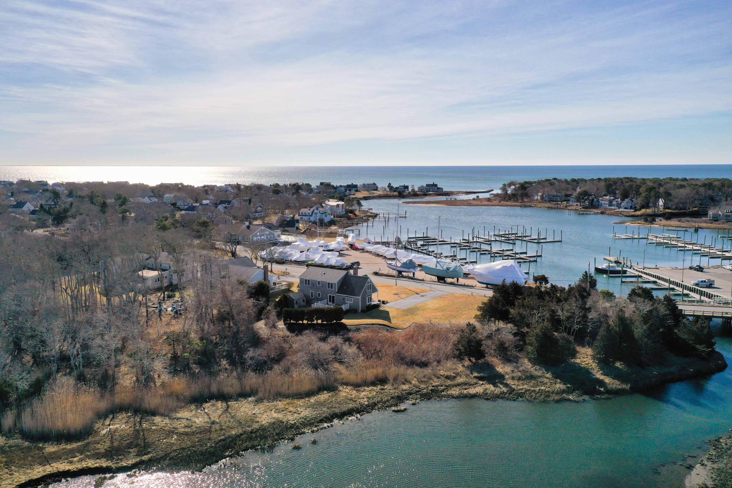 356 Lower County Road Harwich Port, MA 02646 - Photo 2 of 27 a view of a lake with outdoor space