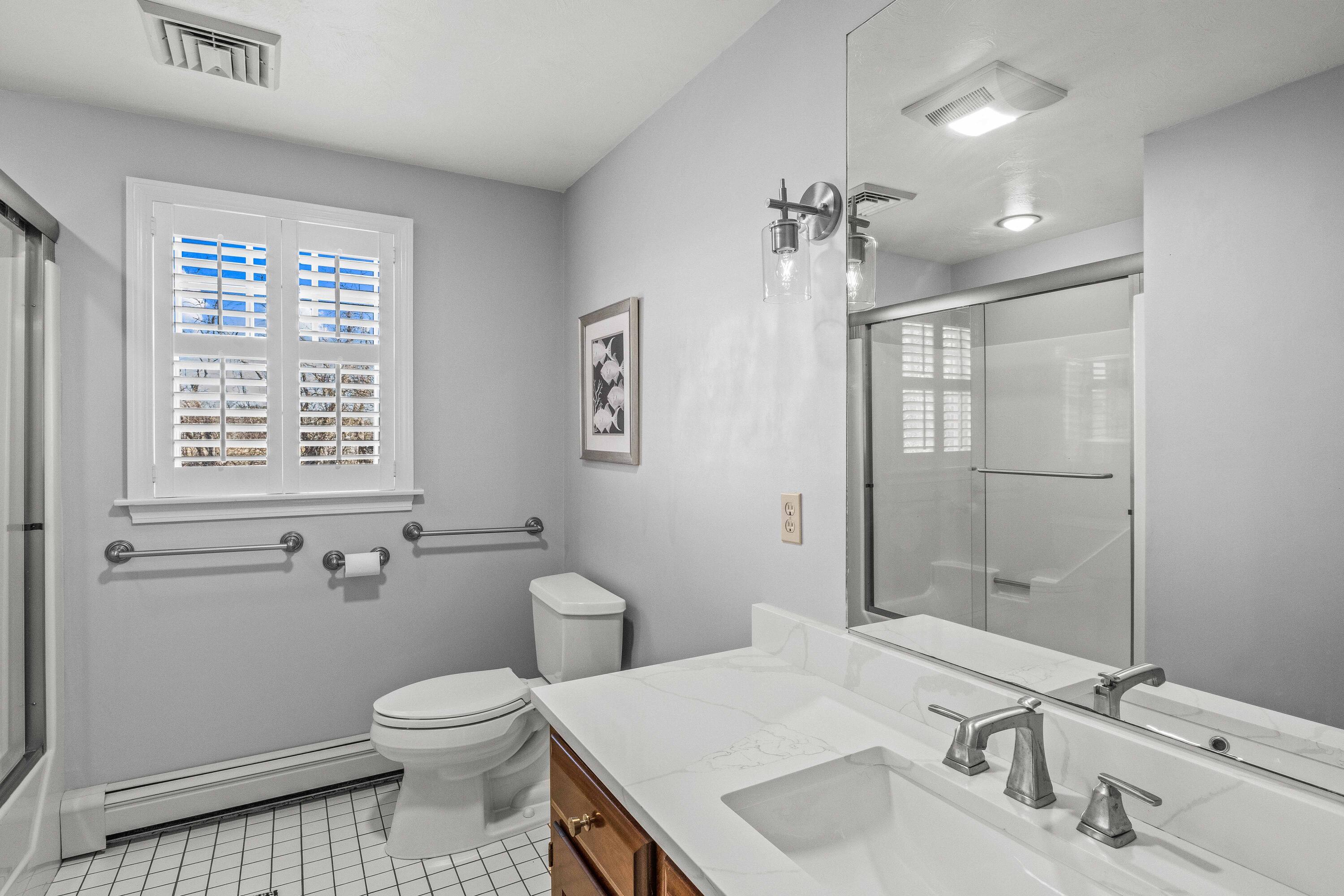 356 Lower County Road Harwich Port, MA 02646 - Photo 21 of 27 a bathroom with a sink a toilet and shower