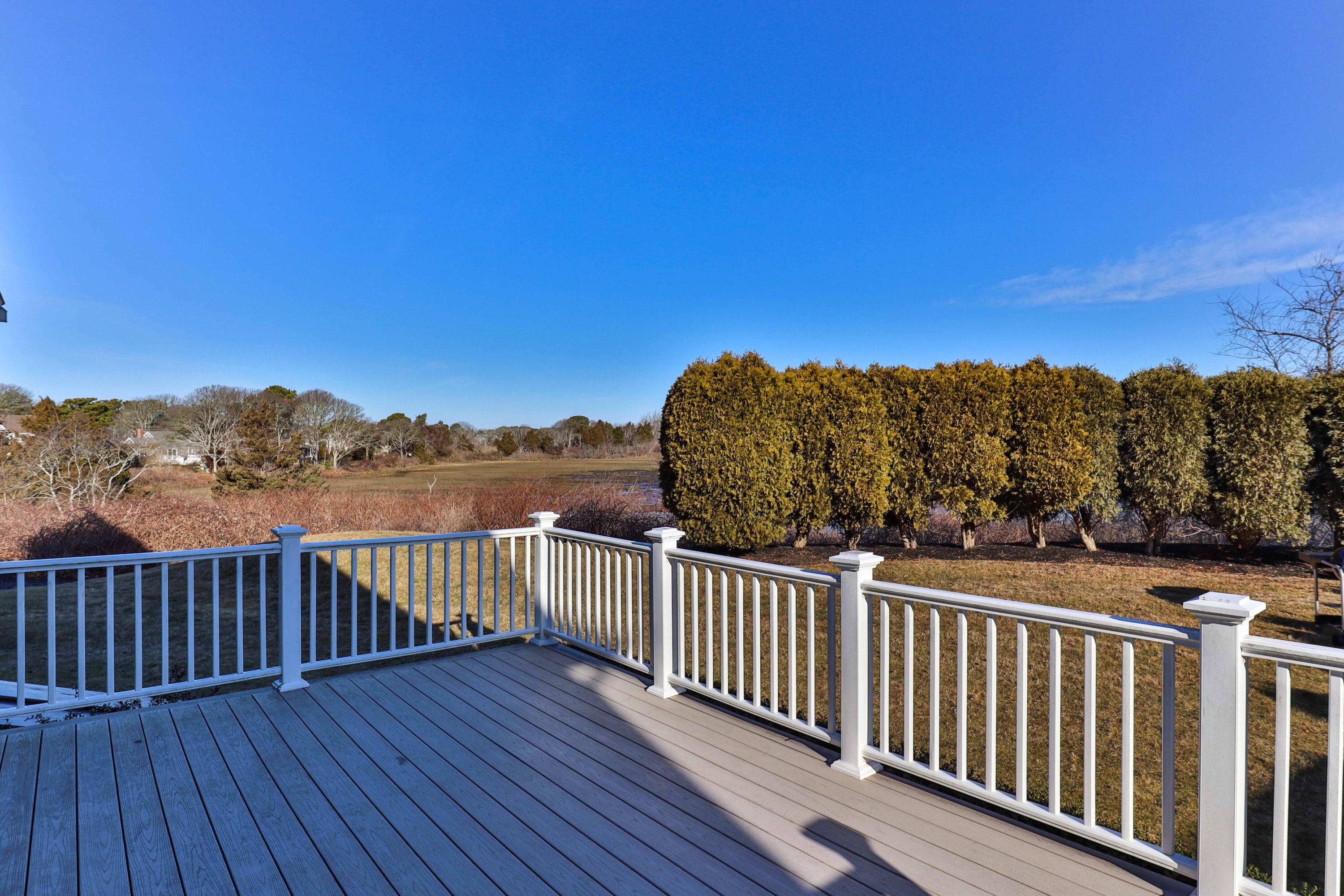356 Lower County Road Harwich Port, MA 02646 - Photo 25 of 27 a view of balcony with wooden floor and fence
