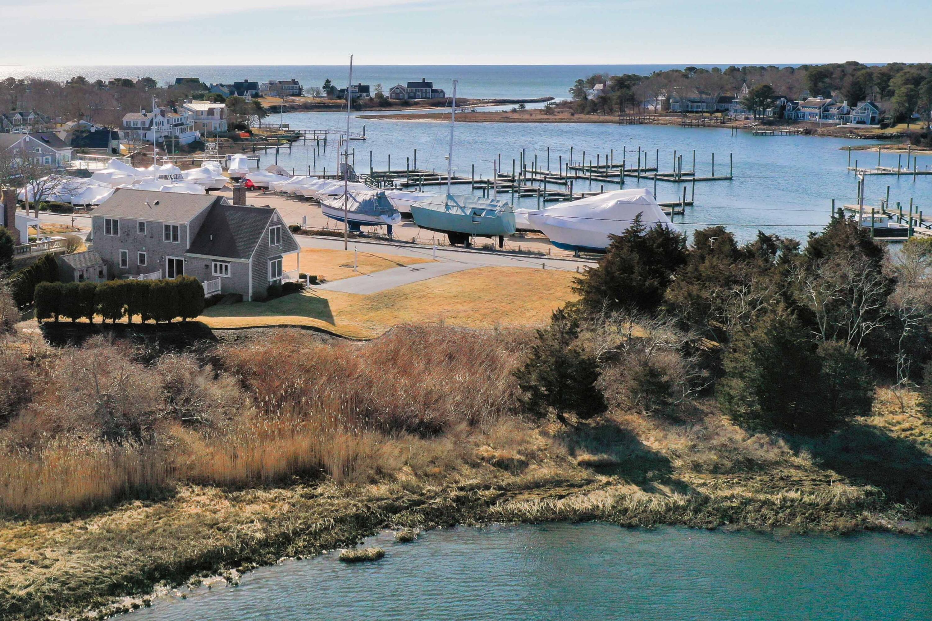 356 Lower County Road Harwich Port, MA 02646 - Photo 3 of 27 a view of a lake with outdoor space