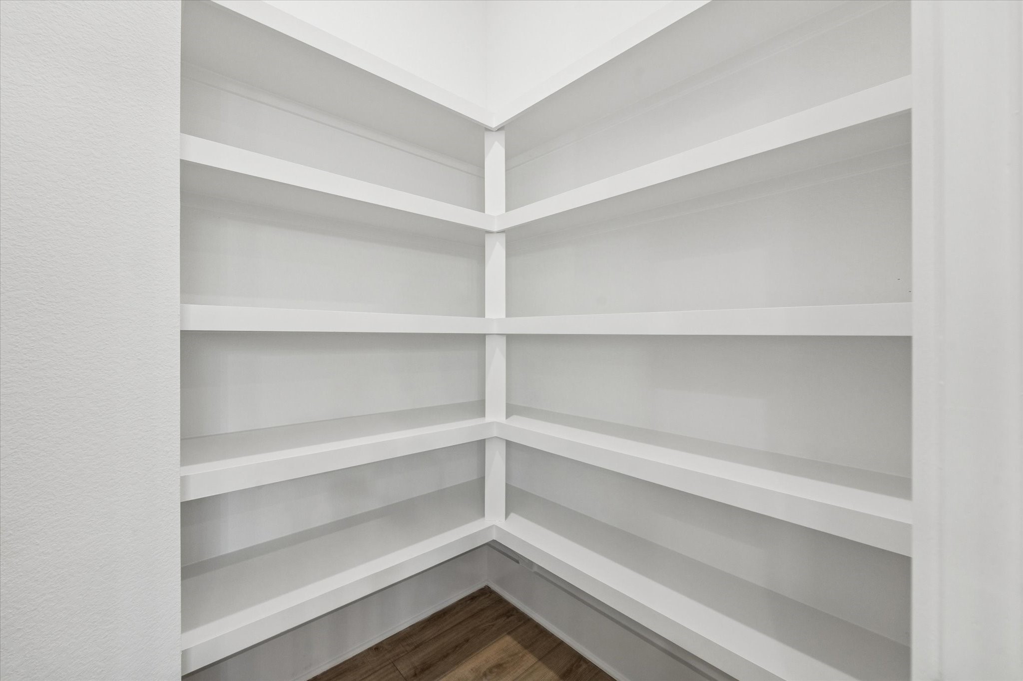 5616 Azores Houston, TX 77091 - Photo 33 of 38 a storage room with wooden floor