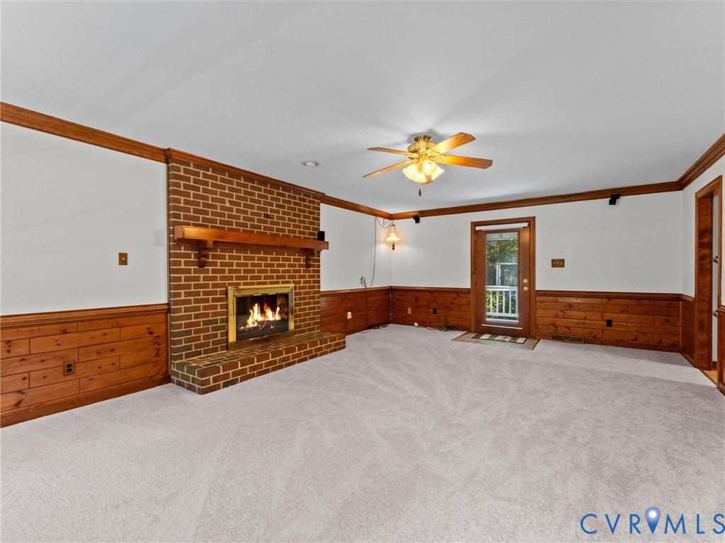 3524 Ludgate Road Chester, VA 23831 - Photo 7 of 44 Brick fireplace with a wood mantel and hearth, com