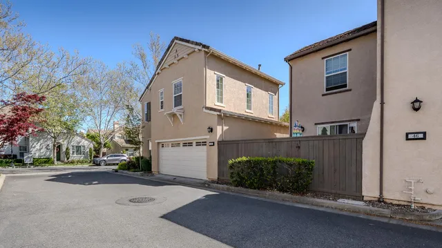 a view of a street with a house