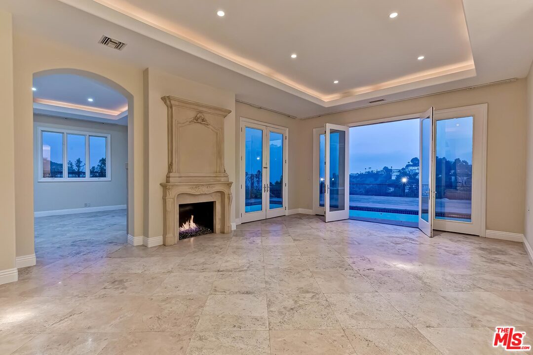 2121 Mt Olympus Drive Los Angeles, CA 90046 - Photo 11 of 34 a view of a livingroom with a fireplace