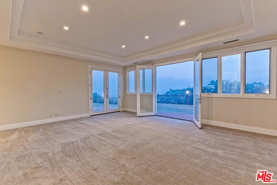 2121 Mt Olympus Drive Los Angeles, CA 90046 - Photo 22 of 34 a view of an empty room with a window