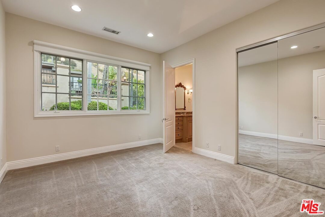 2121 Mt Olympus Drive Los Angeles, CA 90046 - Photo 26 of 34 a view of an empty room with a window