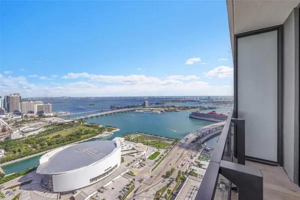 a view of a balcony with an ocean