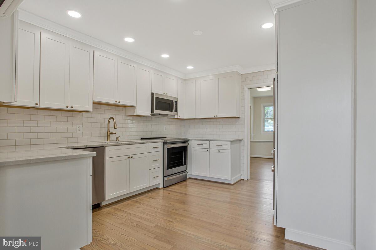 9685 Howes Road Dunkirk, MD 20754 - Photo 11 of 35 Solid surface countertops