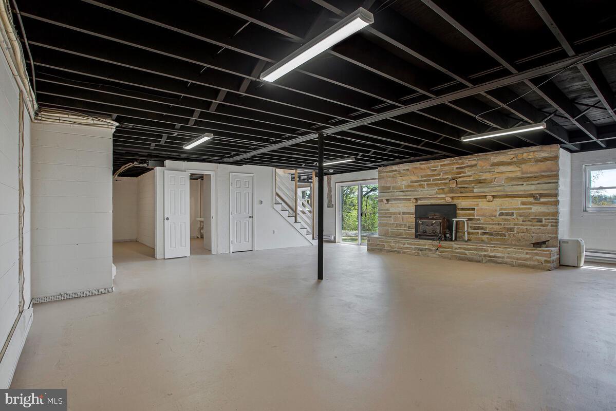 9685 Howes Road Dunkirk, MD 20754 - Photo 32 of 35 Spacious basement with modern finishes.