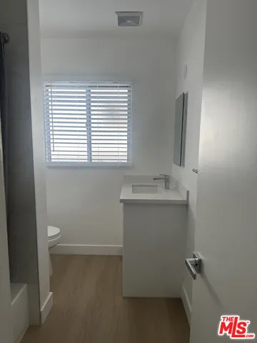 a bathroom with a sink and a vanity