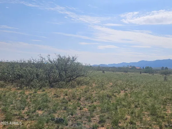 a view of lake with mountain