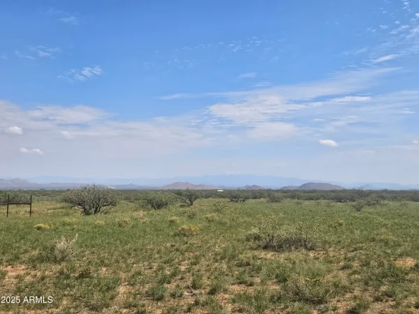 a view of a mountain with a outdoor space
