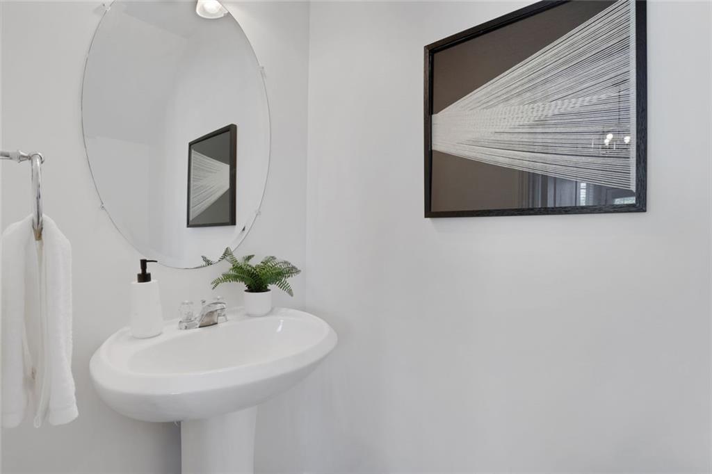 3552 Clear Creek Crossing Northwest Kennesaw, GA 30144 - Photo 22 of 41 a bathroom with a sink and a mirror