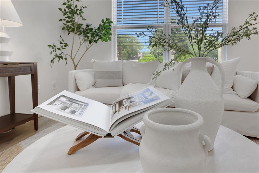 3552 Clear Creek Crossing Northwest Kennesaw, GA 30144 - Photo 9 of 41 a living room with a sink and a potted plant