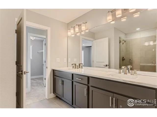 a bathroom with a shower and a toilet