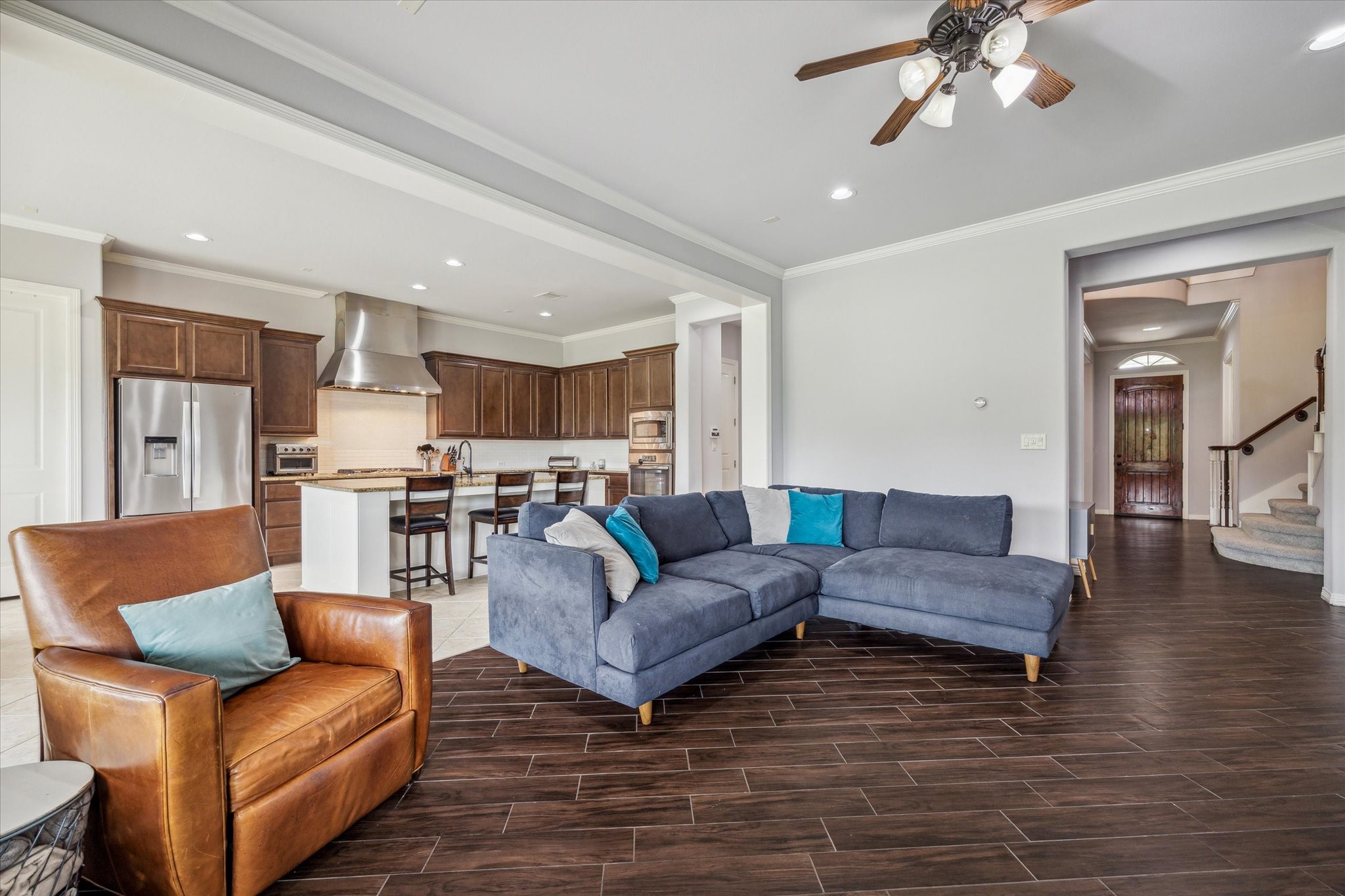 18531 Duke Lake Drive Spring, TX 77388 - Photo 12 of 41 a living room with furniture and a view of kitchen