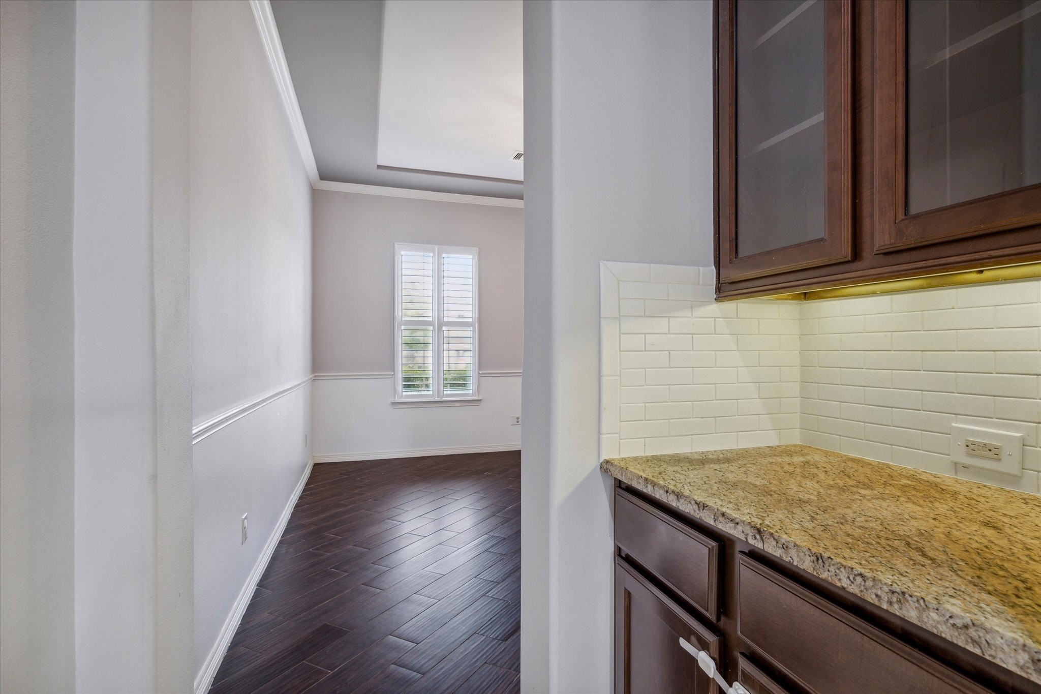 18531 Duke Lake Drive Spring, TX 77388 - Photo 17 of 41 a kitchen with granite countertop wood cabinets and a stove
