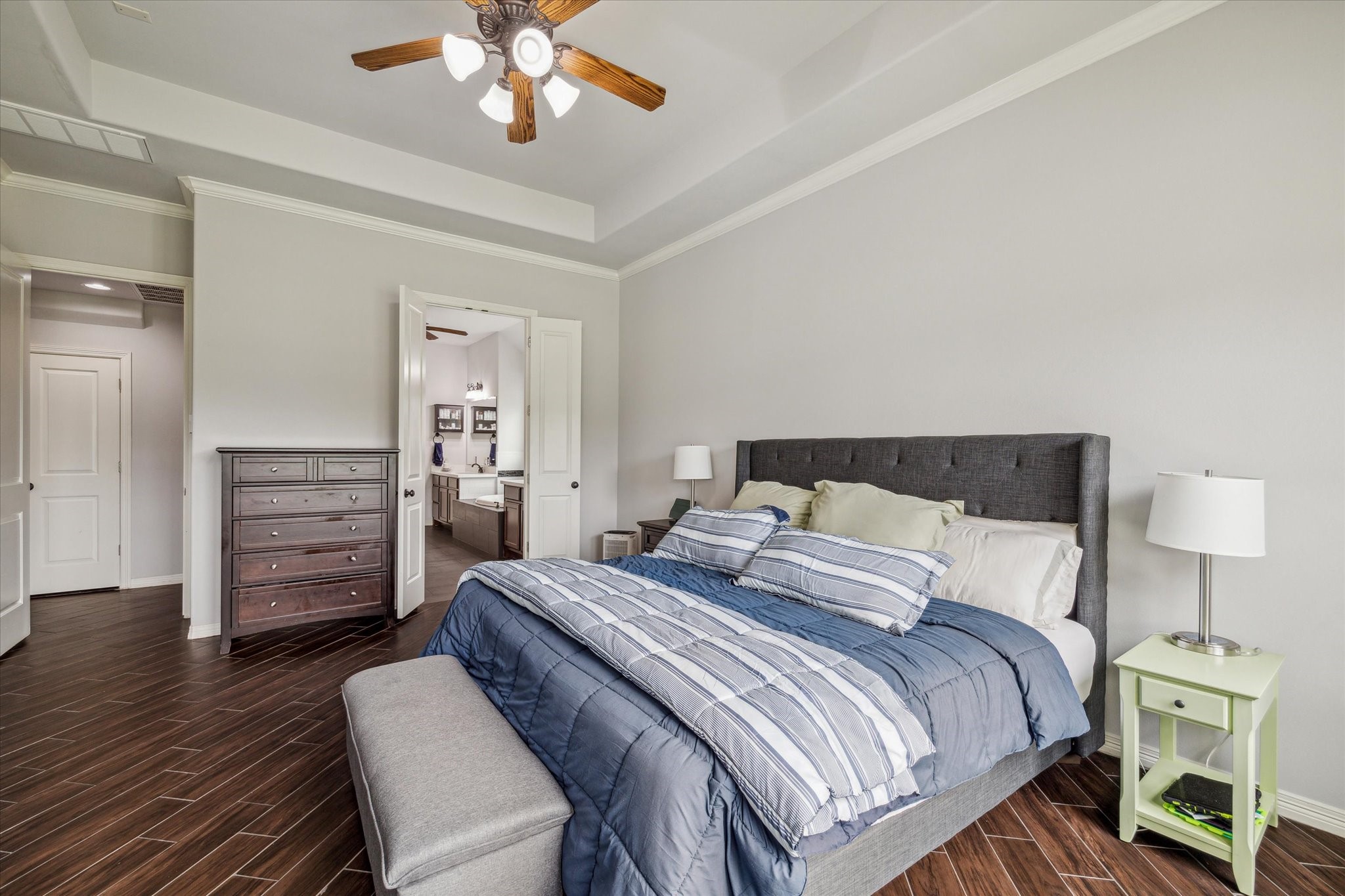 18531 Duke Lake Drive Spring, TX 77388 - Photo 20 of 41 a bedroom with a bed and wooden floor