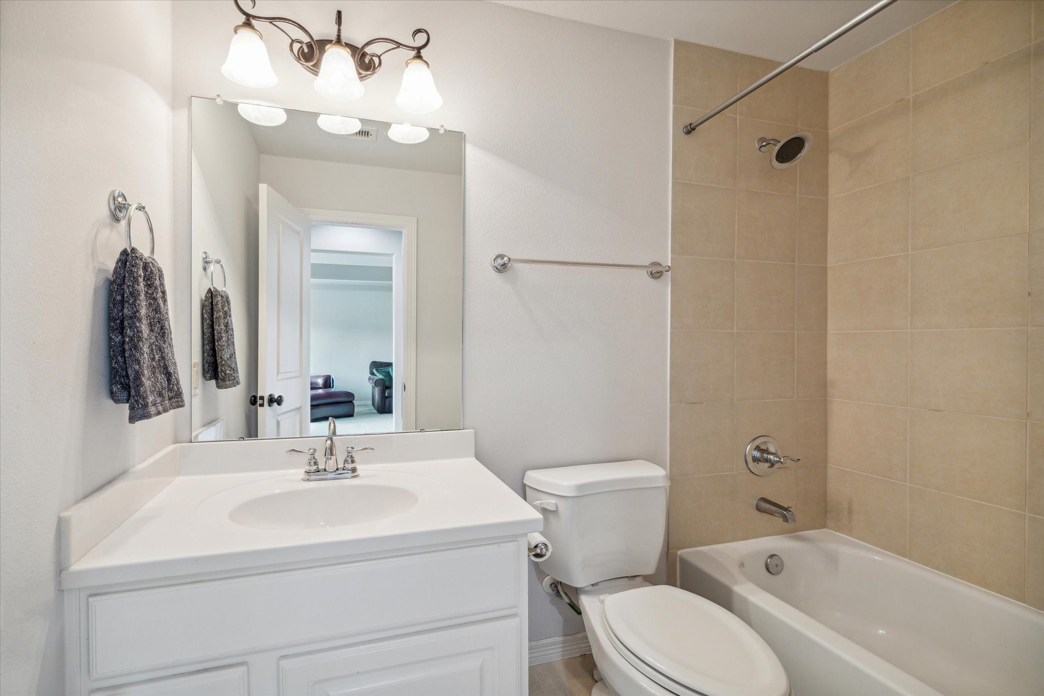 18531 Duke Lake Drive Spring, TX 77388 - Photo 28 of 41 a bathroom with a sink vanity mirror and toilet
