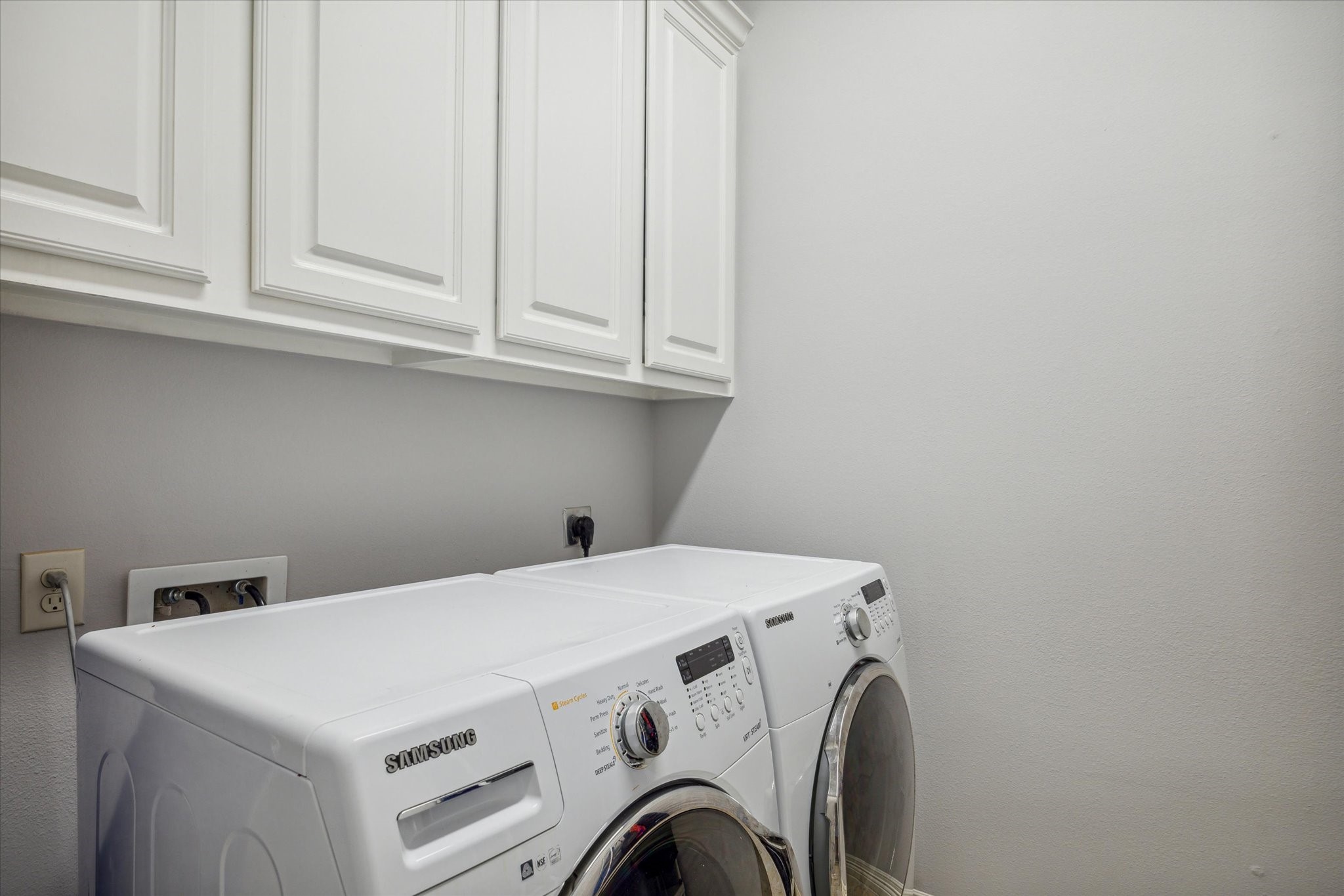 18531 Duke Lake Drive Spring, TX 77388 - Photo 31 of 41 a utility room with dryer and washer