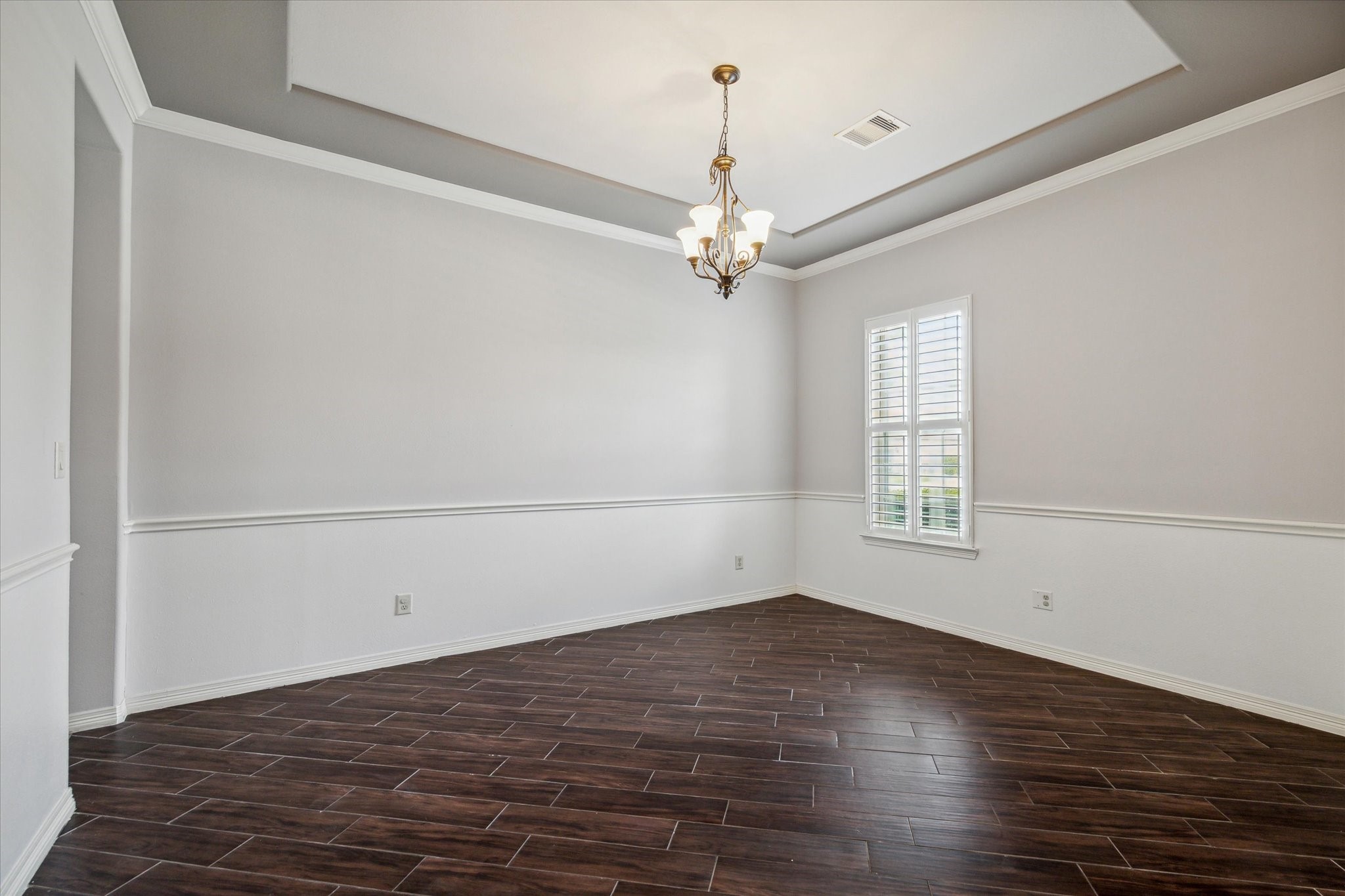 18531 Duke Lake Drive Spring, TX 77388 - Photo 7 of 41 wooden floor in an empty room with a window
