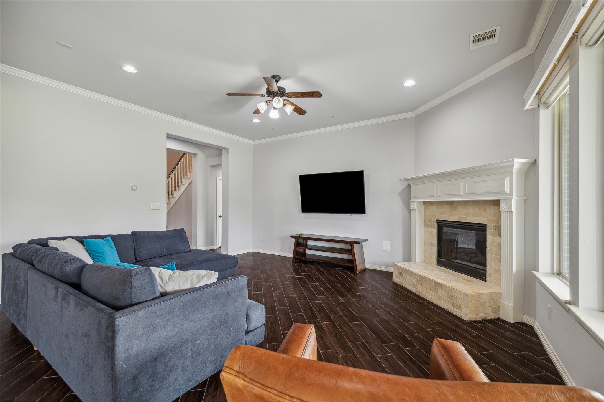 18531 Duke Lake Drive Spring, TX 77388 - Photo 10 of 41 a living room with furniture and a fireplace