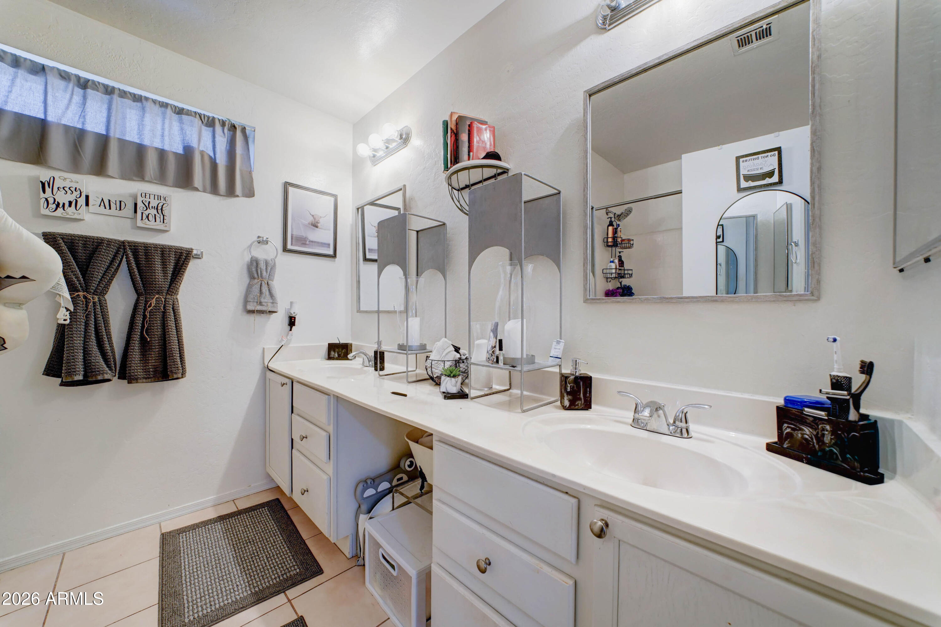 2744 South Raven Mesa, AZ 85209 - Photo 18 of 29 a bathroom with a sink and a mirror
