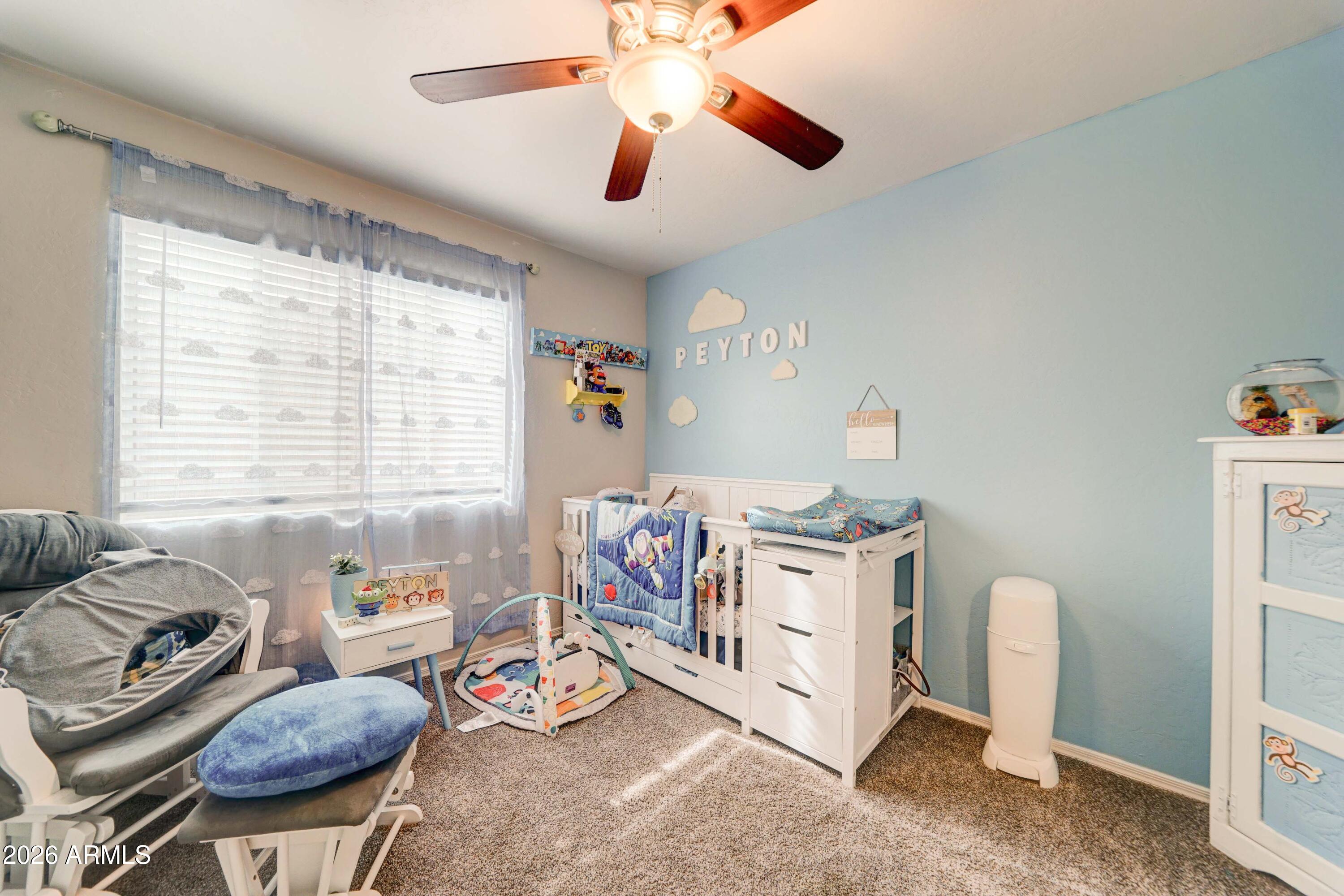 2744 South Raven Mesa, AZ 85209 - Photo 23 of 29 a bedroom with furniture and a chandelier