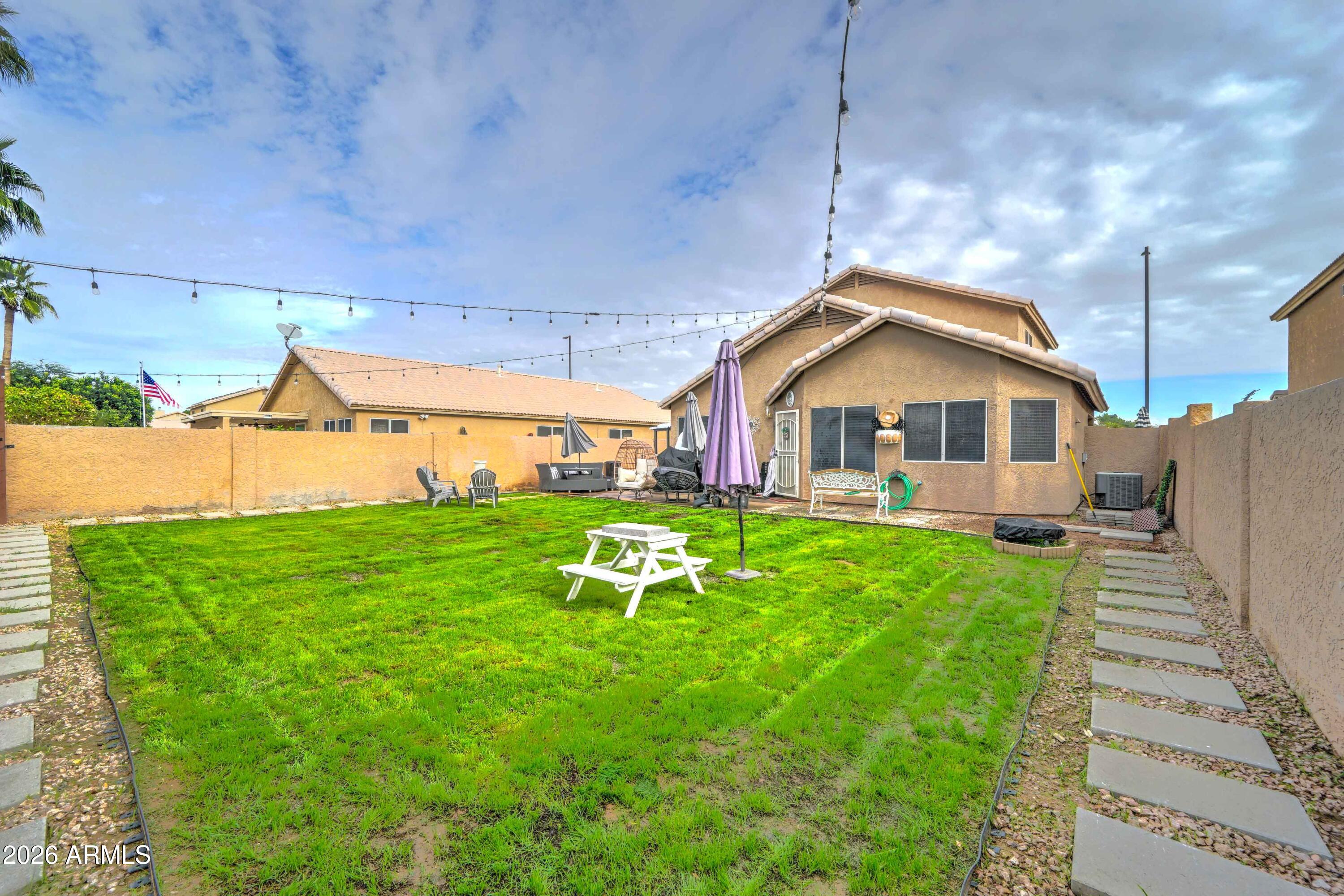 2744 South Raven Mesa, AZ 85209 - Photo 28 of 29 a front view of a house with garden
