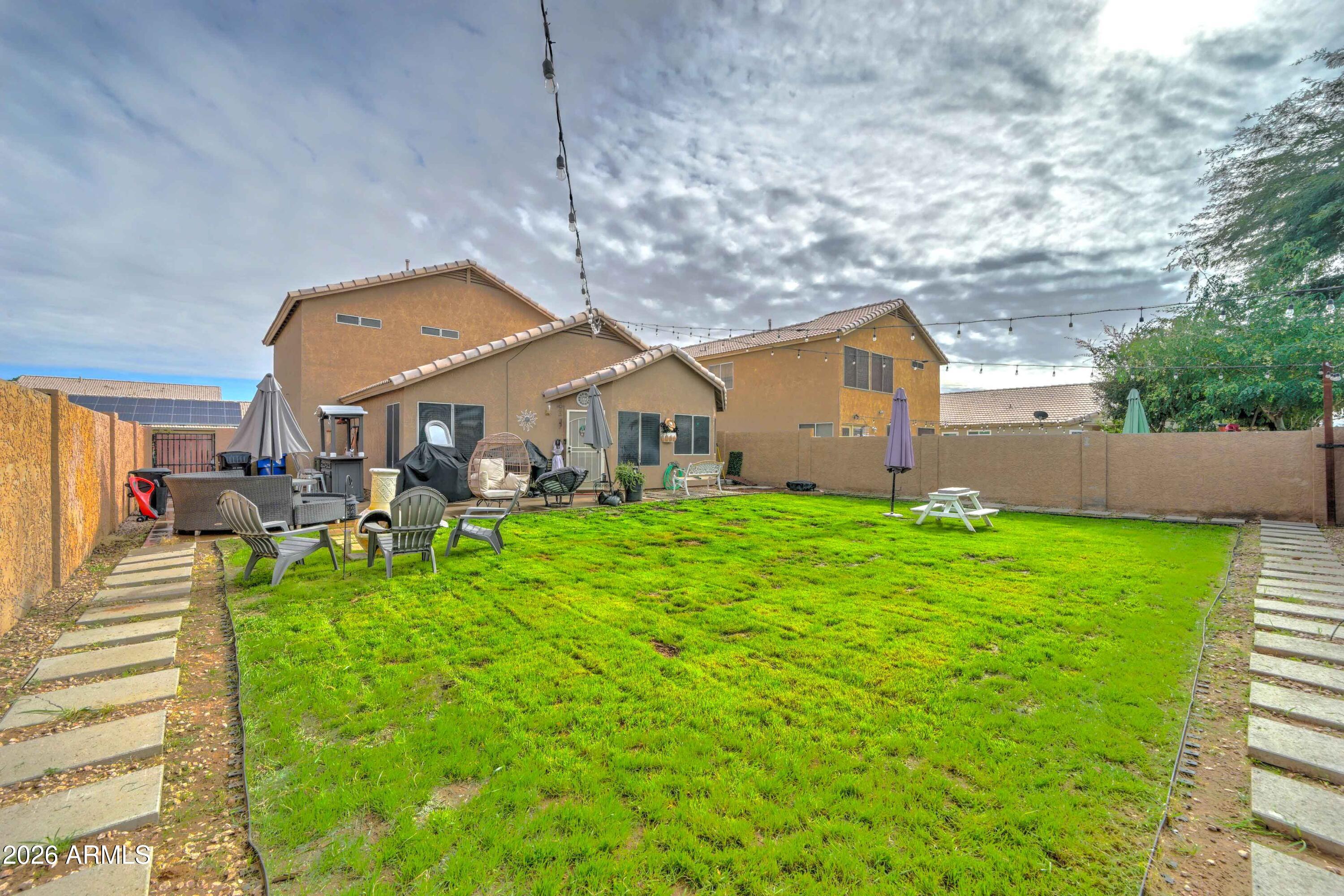 2744 South Raven Mesa, AZ 85209 - Photo 29 of 29 a view of a house with backyard and sitting area