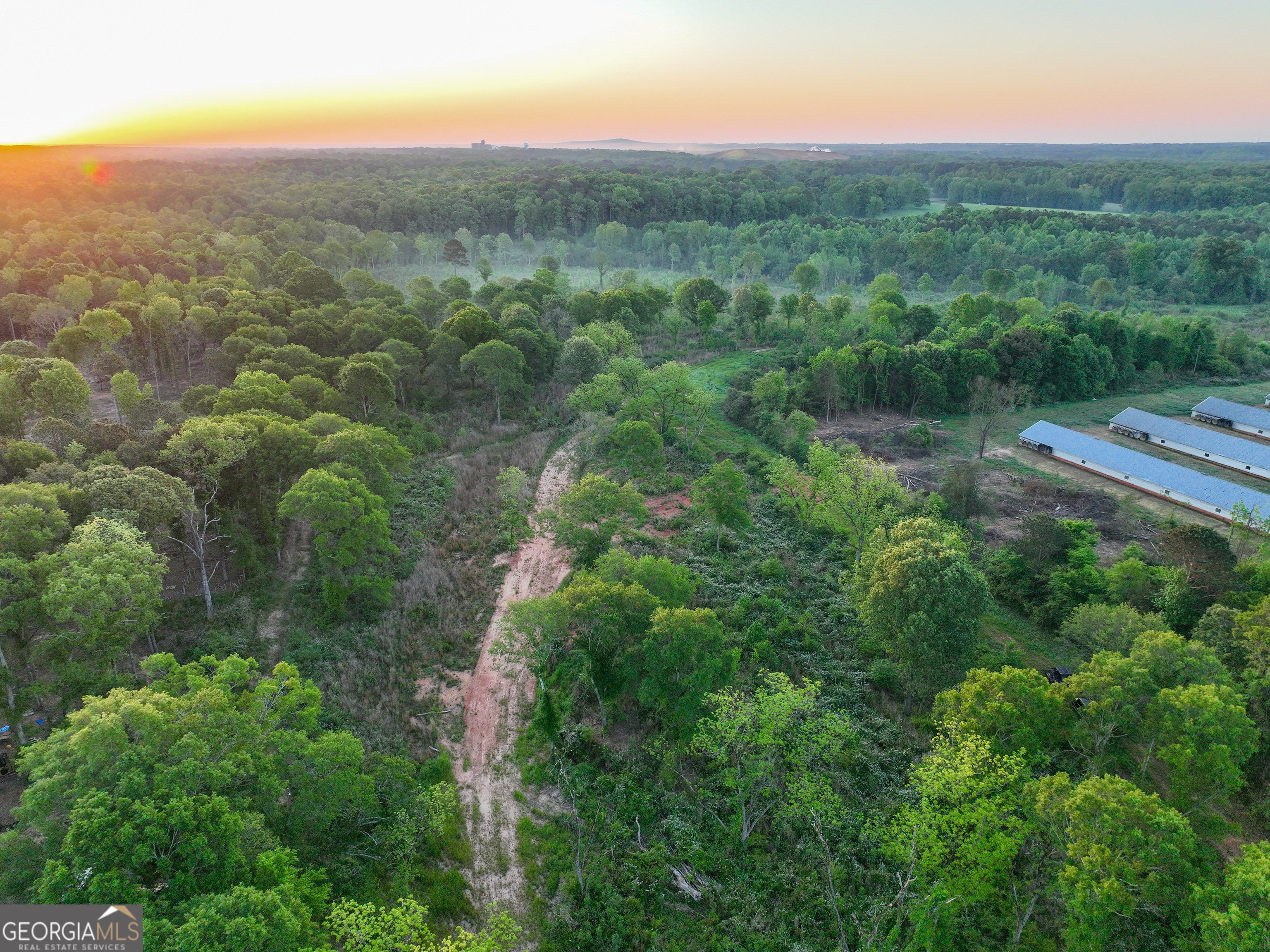 0 Zebulon Road Milner, GA 30257 - Photo 2 of 26 an aerial view of residential houses with outdoor space and trees
