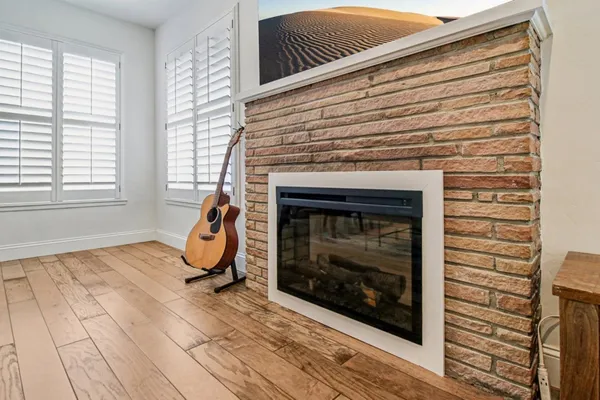 a bedroom with a bed and a desk