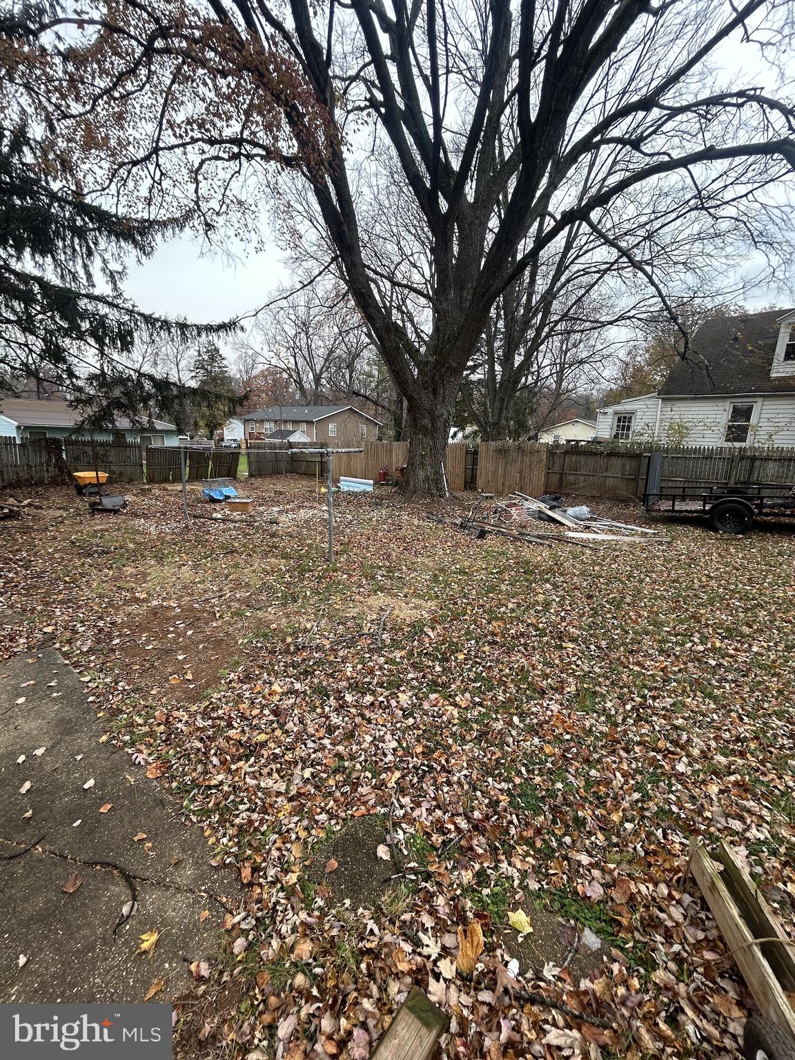 5948 Baltimore Street Baltimore, MD 21207 - Photo 11 of 32 a backyard of a house with lots of green space