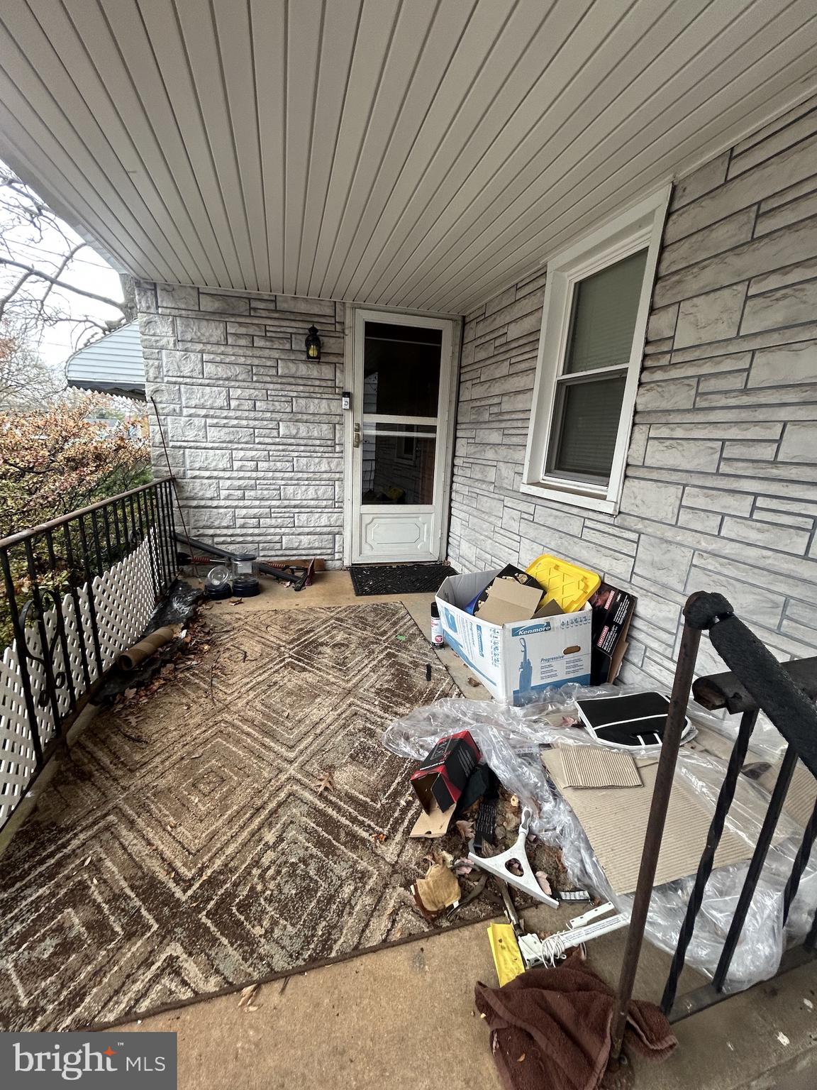 5948 Baltimore Street Baltimore, MD 21207 - Photo 12 of 32 a view of a backyard with a table and chairs