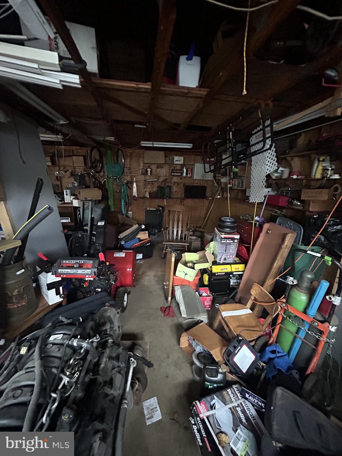 5948 Baltimore Street Baltimore, MD 21207 - Photo 30 of 32 a view of a garage with storage