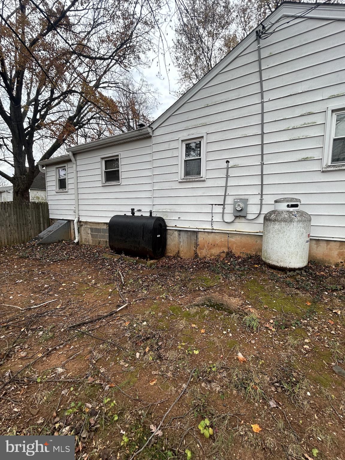 5948 Baltimore Street Baltimore, MD 21207 - Photo 3 of 32 a backyard of a house with barbeque oven and a stove