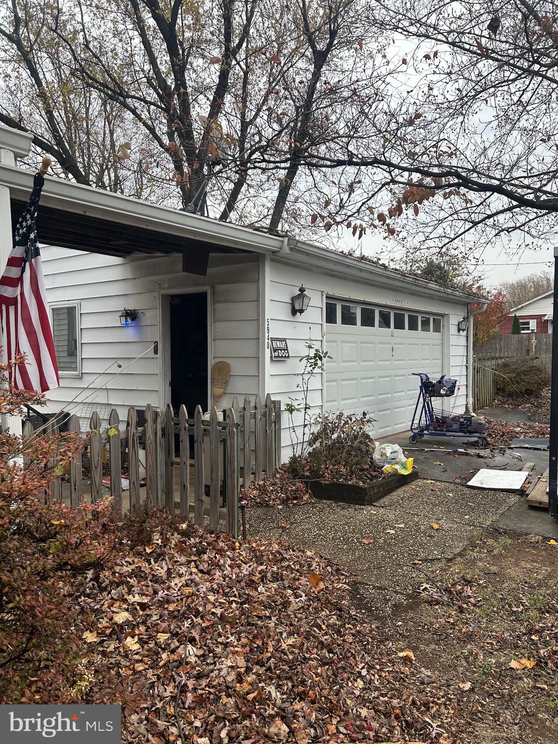 5948 Baltimore Street Baltimore, MD 21207 - Photo 4 of 32 a backyard of a house with barbeque oven and outdoor seating