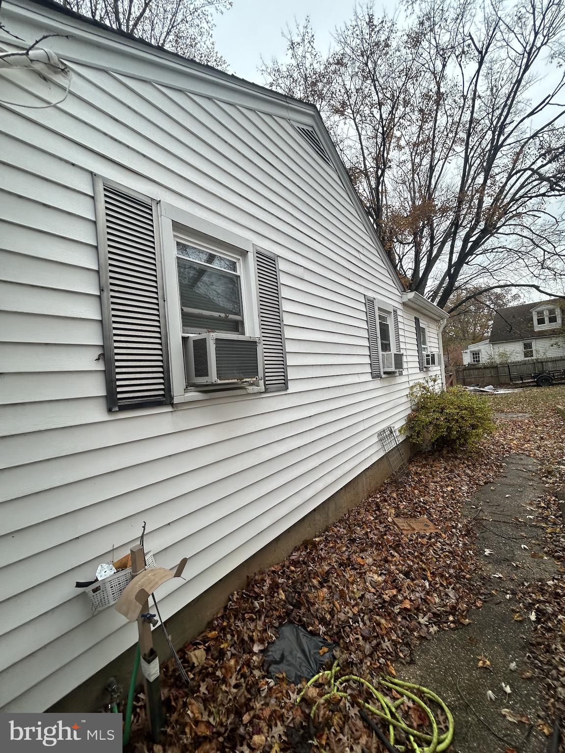 5948 Baltimore Street Baltimore, MD 21207 - Photo 5 of 32 a view of a house with a yard