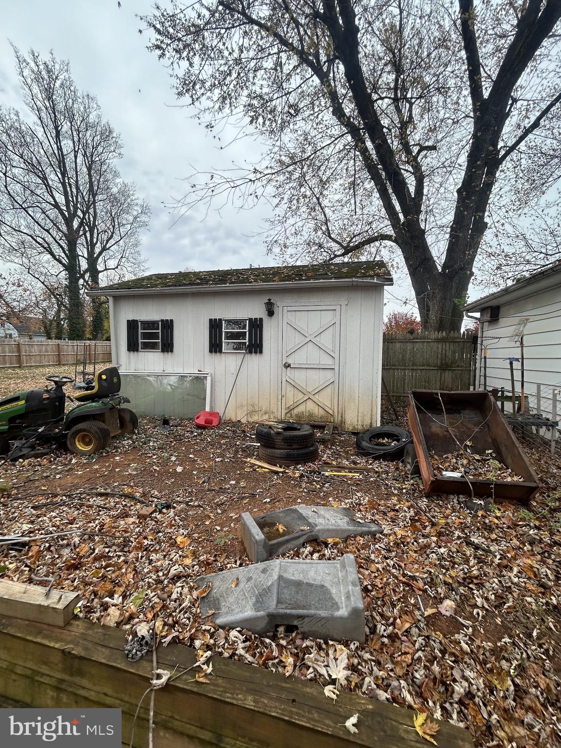 5948 Baltimore Street Baltimore, MD 21207 - Photo 7 of 32 a view of a house with backyard