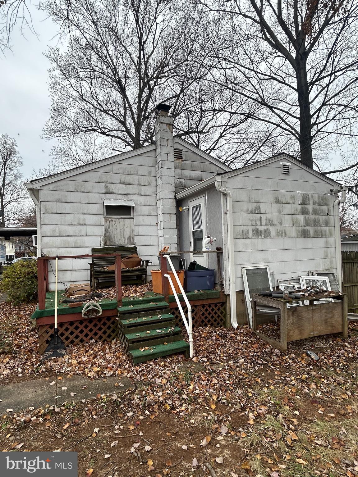 5948 Baltimore Street Baltimore, MD 21207 - Photo 8 of 32 a view of a chairs and table in backyard