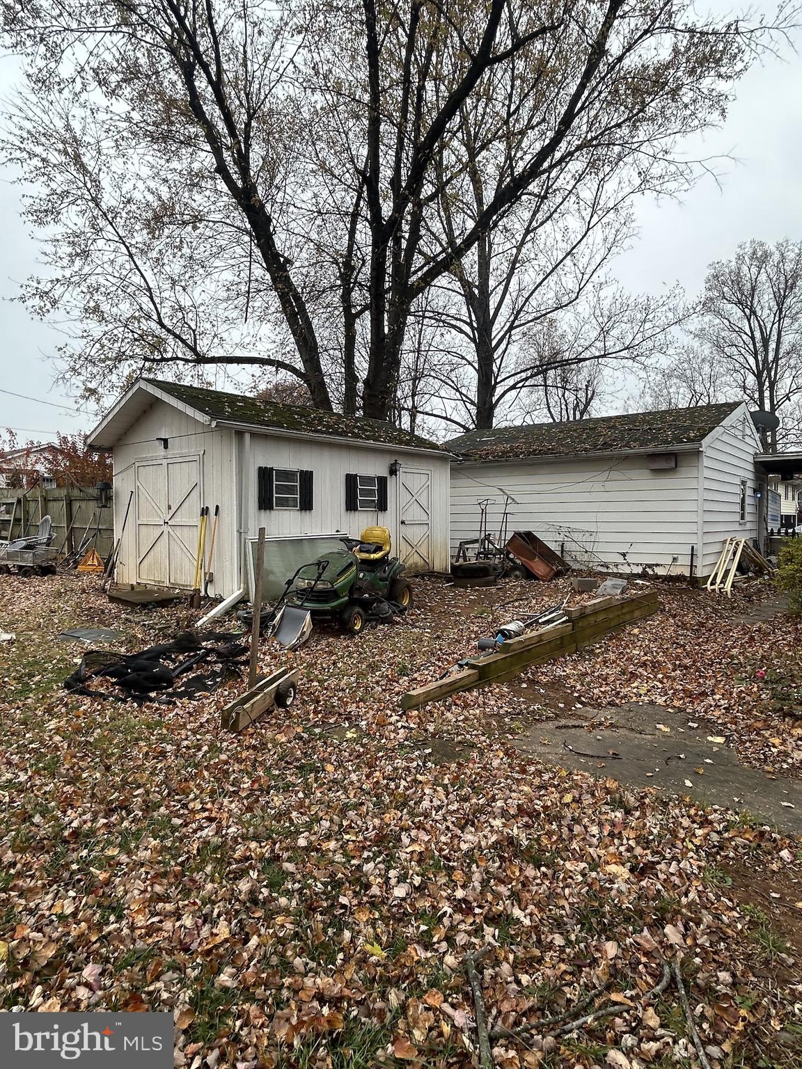 5948 Baltimore Street Baltimore, MD 21207 - Photo 9 of 32 a view of house with backyard and seating area
