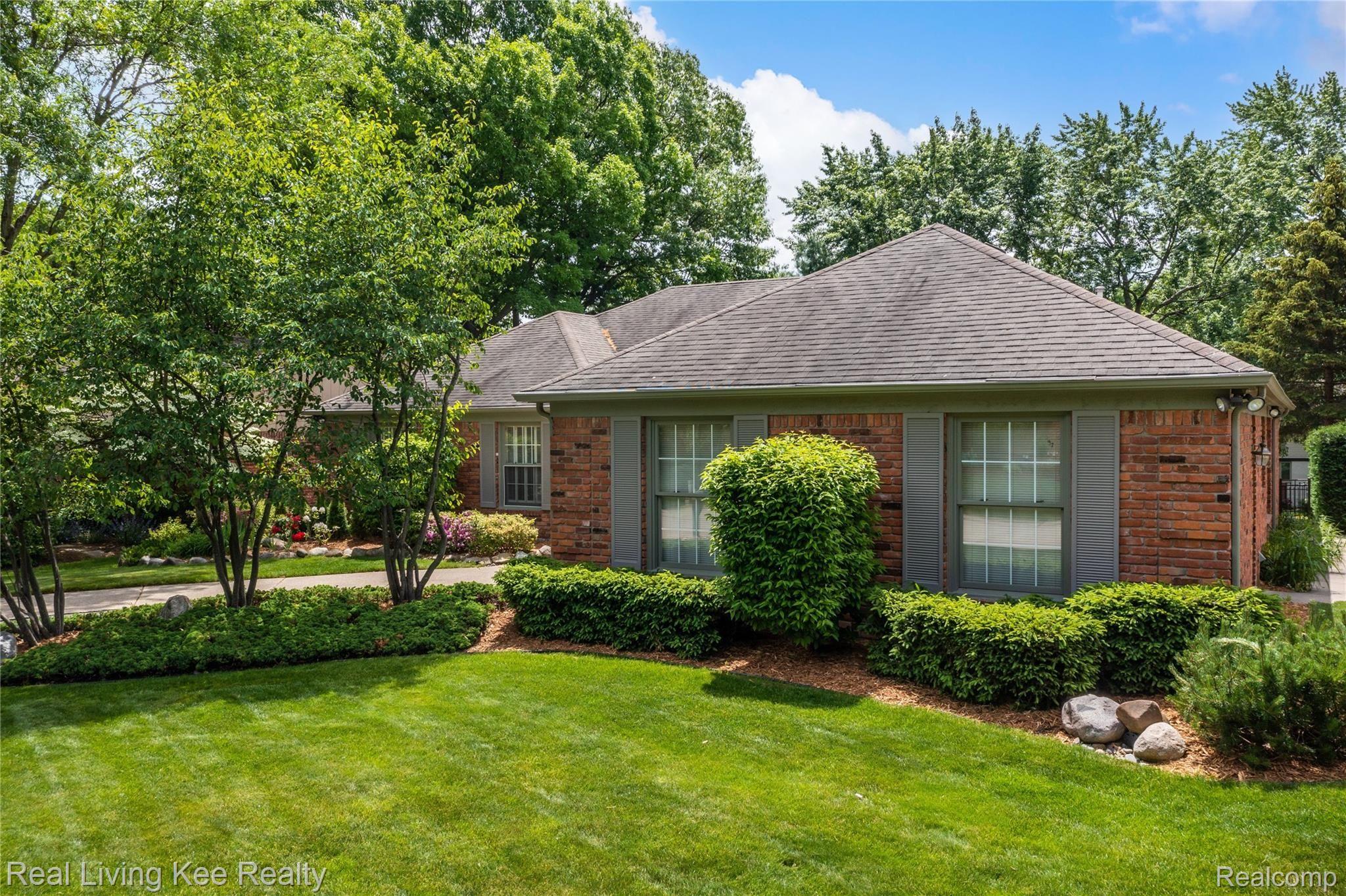 1329 Greenleaf Drive Rochester, MI 48309 - Photo 2 of 49 Mature trees enhance the professional, well groomed landscaping.