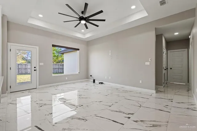 a view of an empty room and window