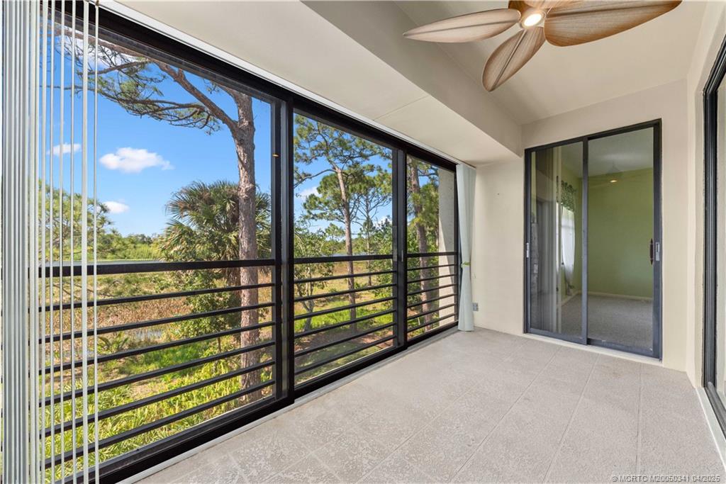 13464 Harbour Ridge Boulevard, Unit 8B Palm City, FL 34990 - Photo 13 of 33 a view of a porch