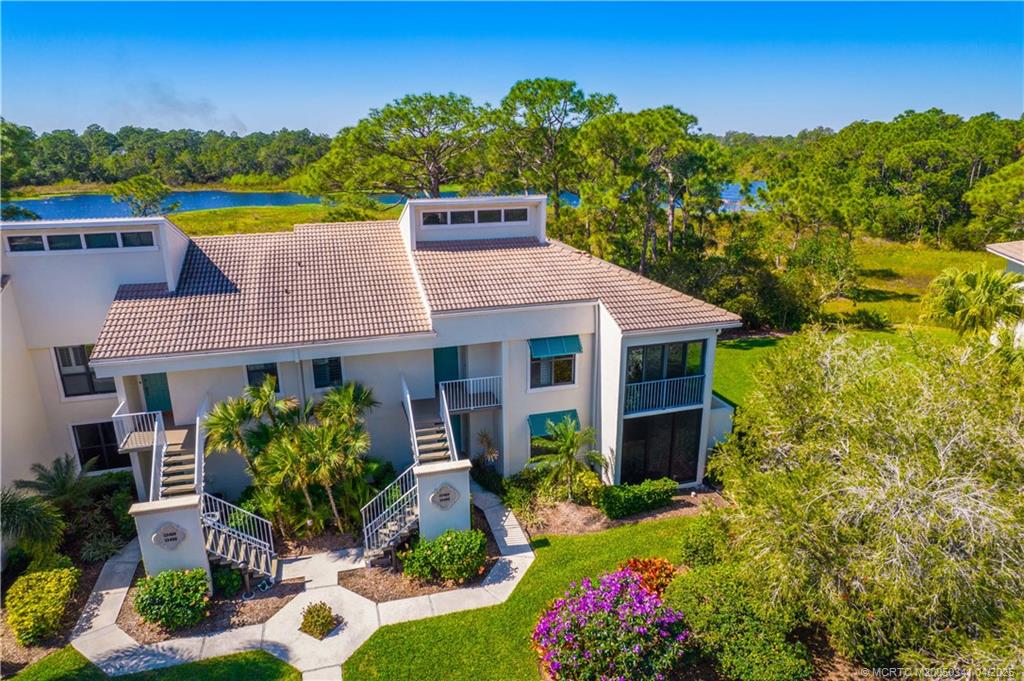 13464 Harbour Ridge Boulevard, Unit 8B Palm City, FL 34990 - Photo 25 of 33 a aerial view of a house