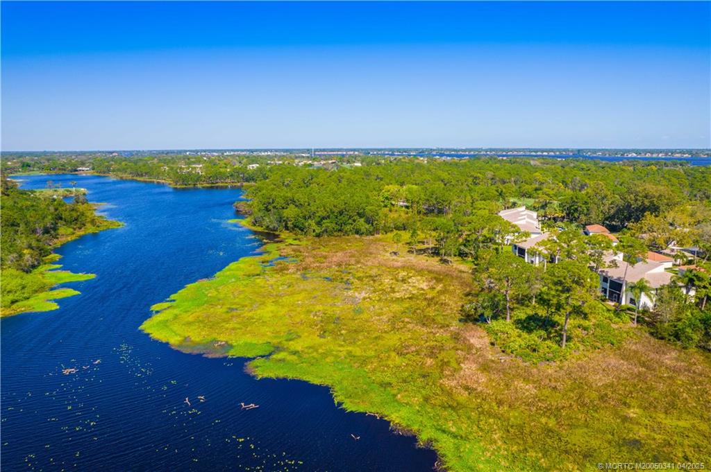 13464 Harbour Ridge Boulevard, Unit 8B Palm City, FL 34990 - Photo 32 of 33 a view of a lake