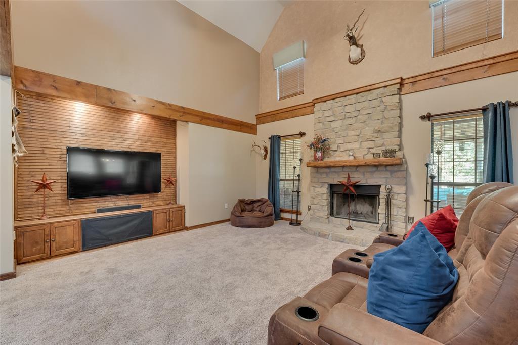 82 Trail Ridge Drive Melissa, TX 75454 - Photo 3 of 29 Living room features high ceilings and wood accents
