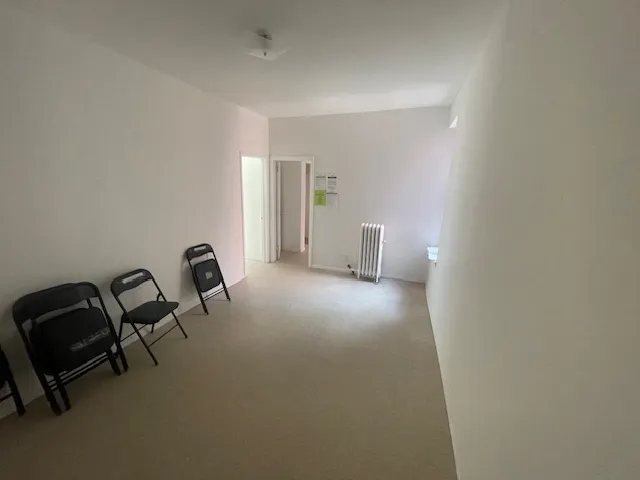 a view of a room with a window