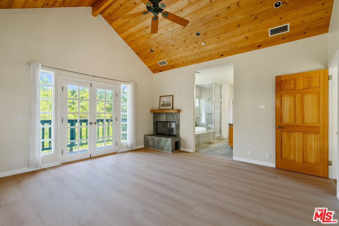 20912 Fontaine Road Topanga, CA 90290 - Photo 20 of 52 a view of a livingroom with wooden floor and furniture
