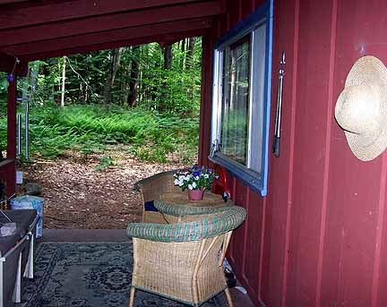 182 Ford Hill Road Rowe, MA 01367 - Photo 3 of 9 a view of a house with backyard fountain and dining area